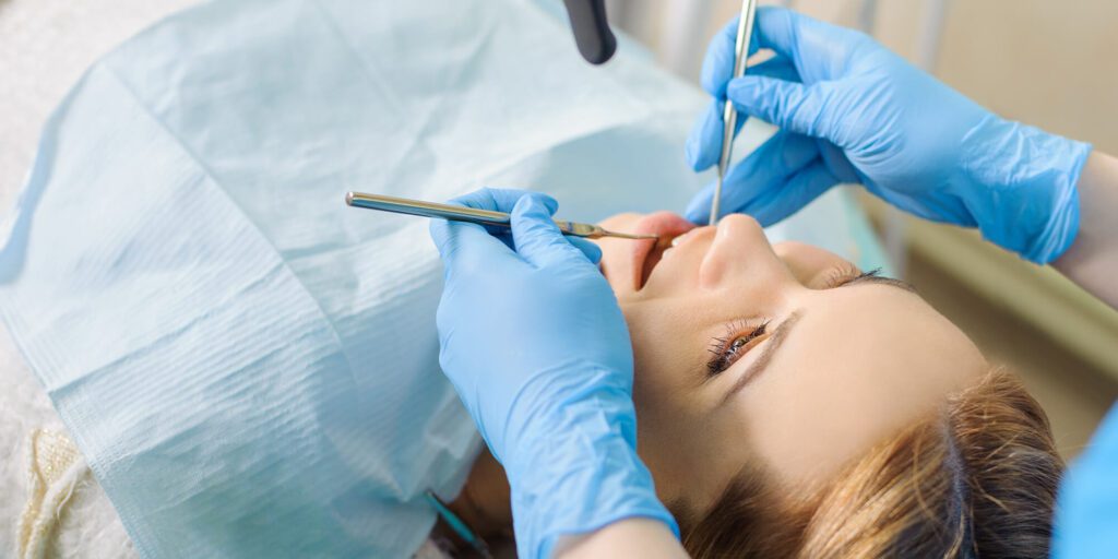 patient receiving a dental exam